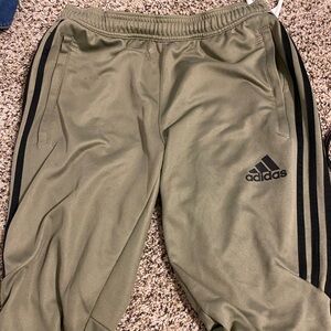 Adidas green sweatpants ! These pants have zippers near the ankles